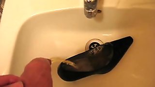 Peeing in wifes high heel shoe